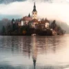 Ravensburger Landschappen|Steden En Gebouwen<Het eiland Bled in Slovenië - puzzel van 1500 stukjes